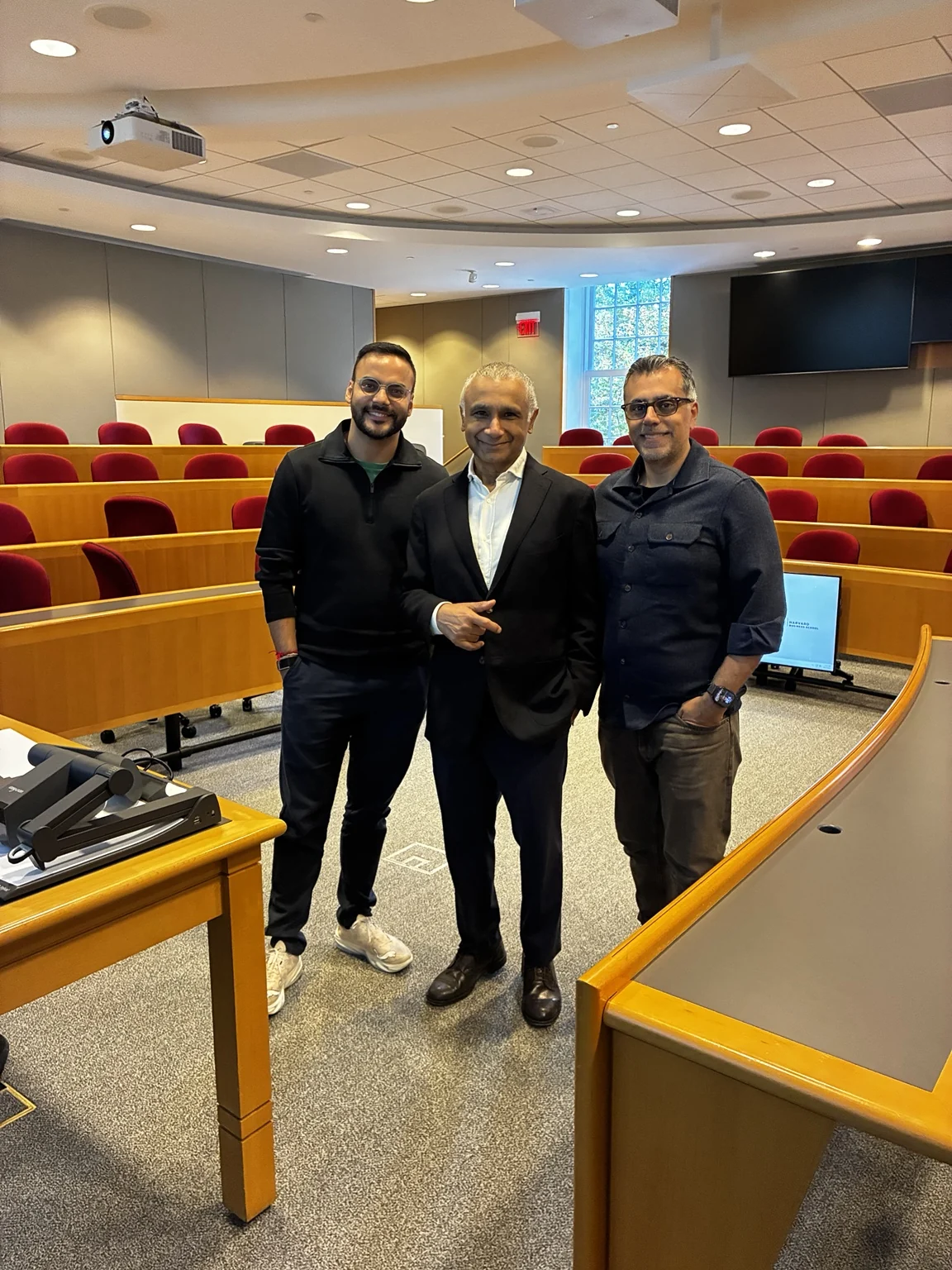 Robin Singhvi, Prof Ghosh and Vinay in a Harvard Business School classroom.